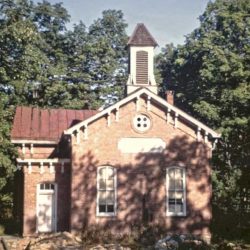 Period Photo Of The Original Schoolhouse Building